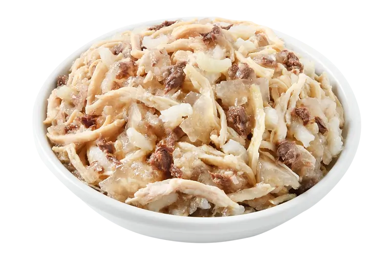 Bowl of noodles with meat and vegetables on a white background